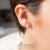 Delicate Small Tiny Fleur De Lis Stud Steel Earrings - Monera-Design Co., Ltd